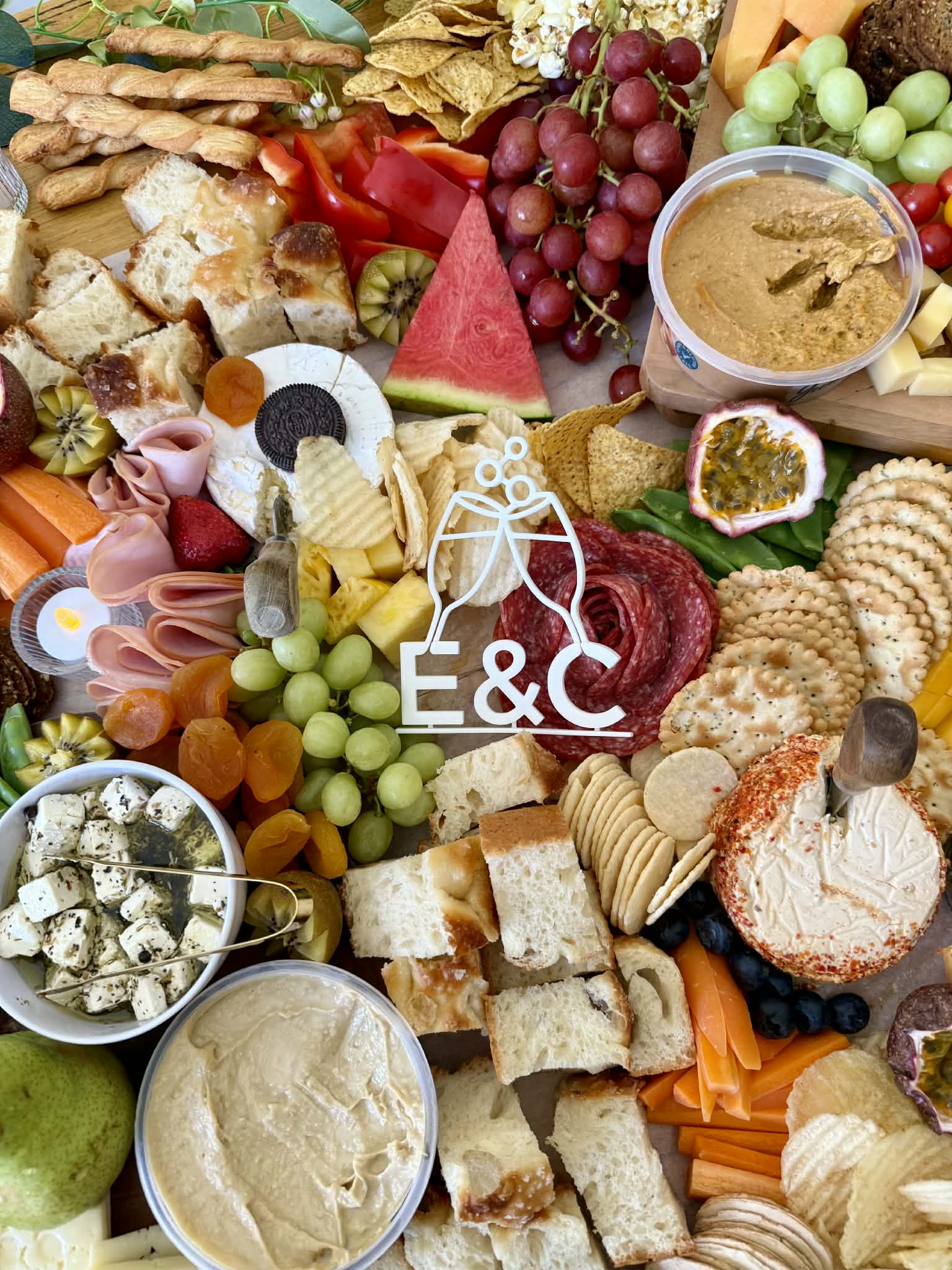 Grazing table with E&C logo centerpiece